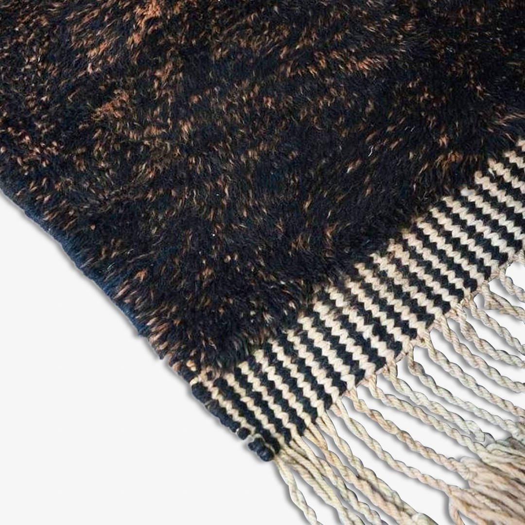 Snake black white and brown rug